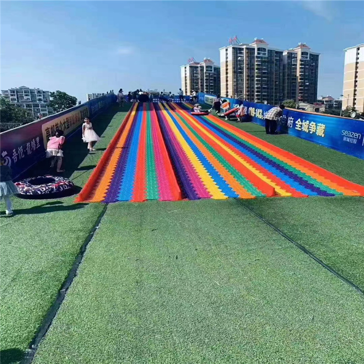 色彩艳丽七彩滑道租赁鸿升提供彩虹滑道出售